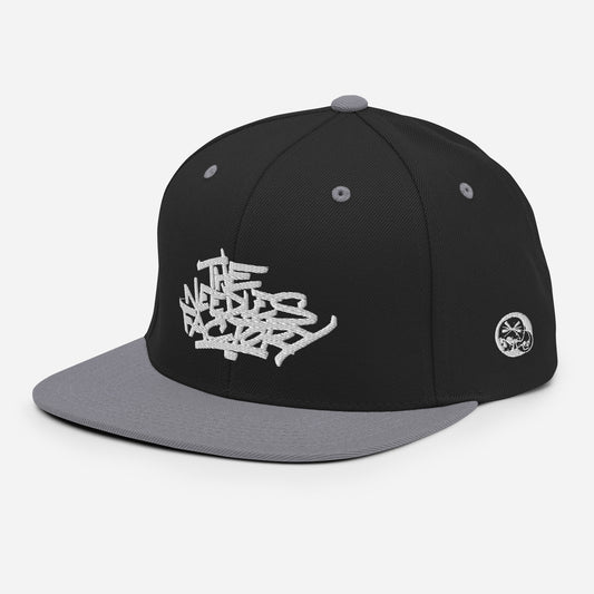 White Embroidered Snapback Cap – The Needles Factory Logo